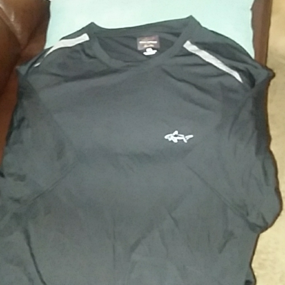 Greg Norman crew neck polyester dri fit golf shirt